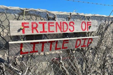 Friends of Little Dip sign - red letters on wood