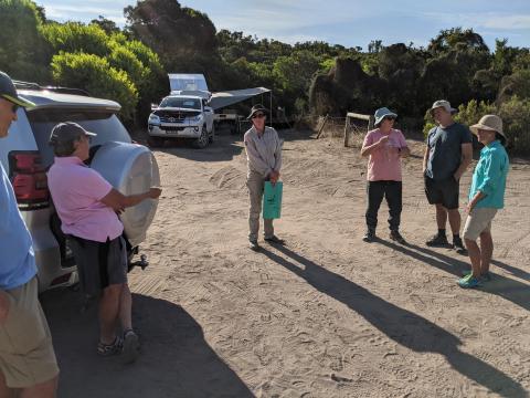 volunteers talking with the ranger