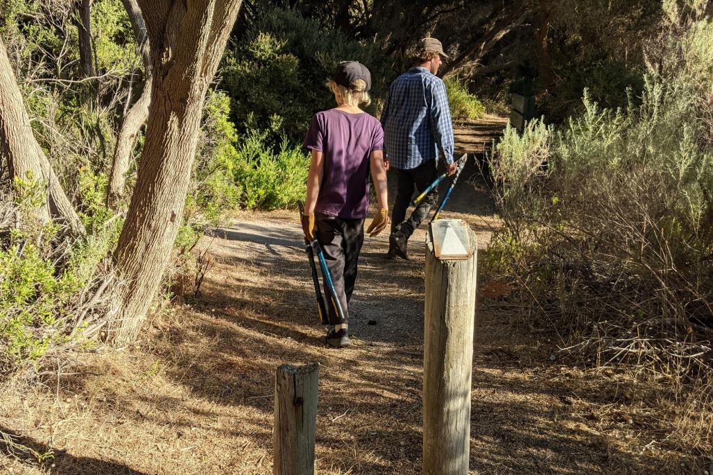 man and son entering the trail