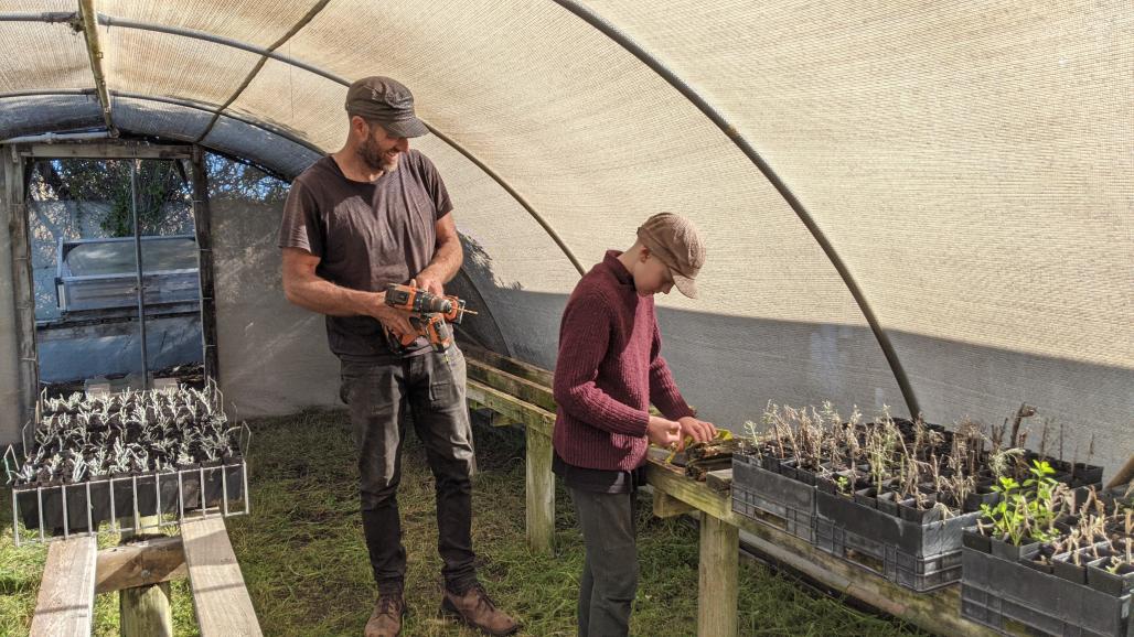 boy and father working